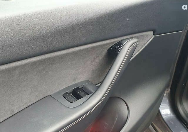 Сірий Тесла Model Y, об'ємом двигуна 0 л та пробігом 84 тис. км за 27900 $, фото 22 на Automoto.ua