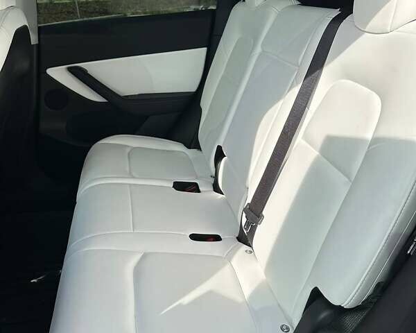 Серый Тесла Model Y, объемом двигателя 0 л и пробегом 74 тыс. км за 27800 $, фото 6 на Automoto.ua