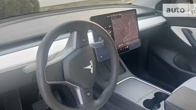 Серый Тесла Model Y, объемом двигателя 0 л и пробегом 61 тыс. км за 22900 $, фото 10 на Automoto.ua