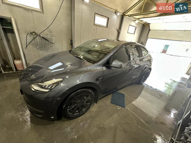 Серый Тесла Model Y, объемом двигателя 0 л и пробегом 55 тыс. км за 29000 $, фото 6 на Automoto.ua