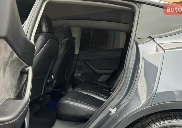 Серый Тесла Model Y, объемом двигателя 0 л и пробегом 138 тыс. км за 20200 $, фото 37 на Automoto.ua