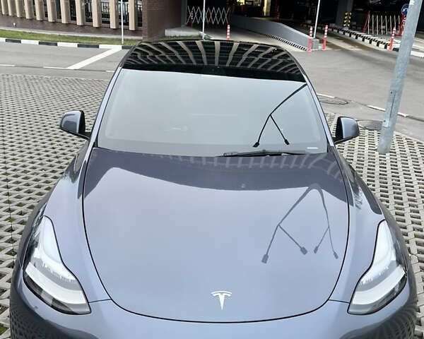 Серый Тесла Model Y, объемом двигателя 0 л и пробегом 22 тыс. км за 26900 $, фото 3 на Automoto.ua