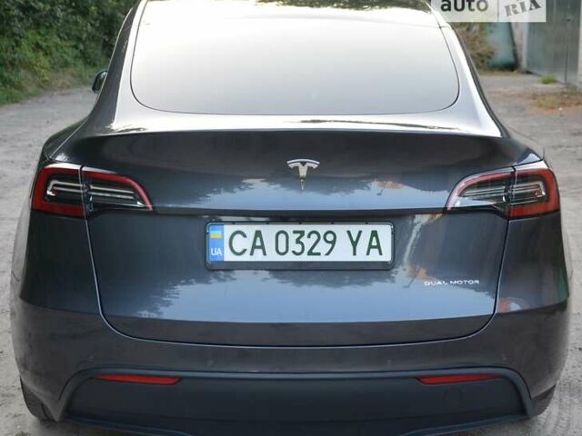 Серый Тесла Model Y, объемом двигателя 0 л и пробегом 52 тыс. км за 27600 $, фото 4 на Automoto.ua