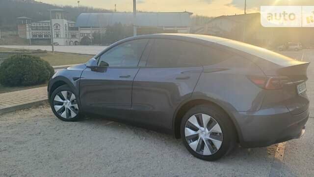 Серый Тесла Model Y, объемом двигателя 0 л и пробегом 61 тыс. км за 22900 $, фото 8 на Automoto.ua
