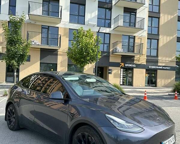 Серый Тесла Model Y, объемом двигателя 0 л и пробегом 74 тыс. км за 27800 $, фото 2 на Automoto.ua