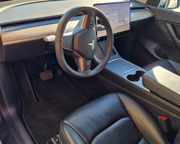 Серый Тесла Model Y, объемом двигателя 0 л и пробегом 76 тыс. км за 29700 $, фото 8 на Automoto.ua