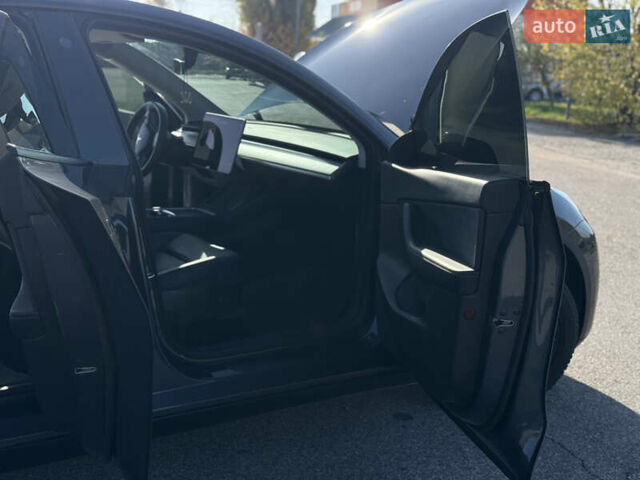Серый Тесла Model Y, объемом двигателя 0 л и пробегом 44 тыс. км за 26000 $, фото 27 на Automoto.ua