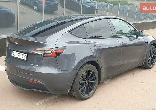 Серый Тесла Model Y, объемом двигателя 0 л и пробегом 84 тыс. км за 24999 $, фото 12 на Automoto.ua