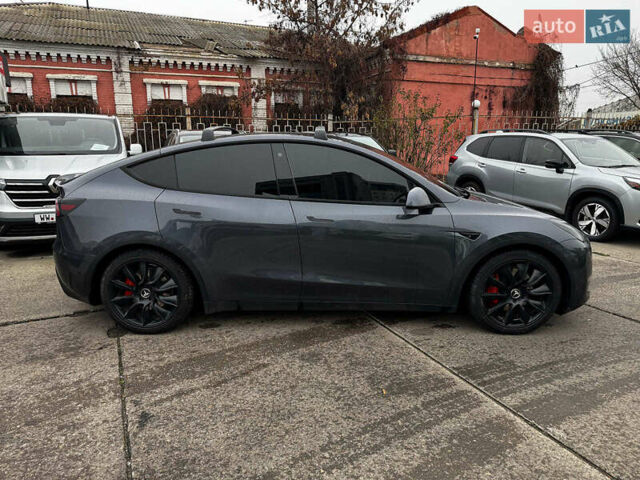 Серый Тесла Model Y, объемом двигателя 0 л и пробегом 98 тыс. км за 29490 $, фото 6 на Automoto.ua