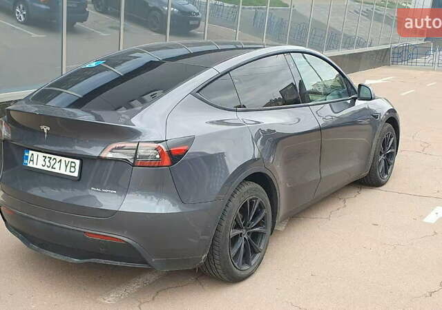 Серый Тесла Model Y, объемом двигателя 0 л и пробегом 84 тыс. км за 24999 $, фото 9 на Automoto.ua