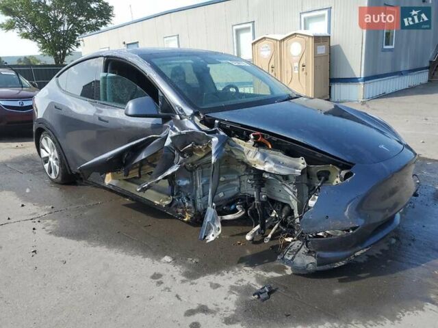 Серый Тесла Model Y, объемом двигателя 0 л и пробегом 81 тыс. км за 17500 $, фото 3 на Automoto.ua