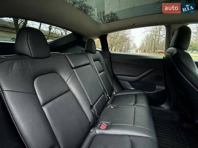 Серый Тесла Model Y, объемом двигателя 0 л и пробегом 92 тыс. км за 24499 $, фото 14 на Automoto.ua