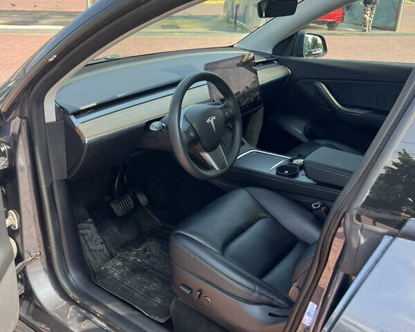 Серый Тесла Model Y, объемом двигателя 0 л и пробегом 96 тыс. км за 21900 $, фото 4 на Automoto.ua