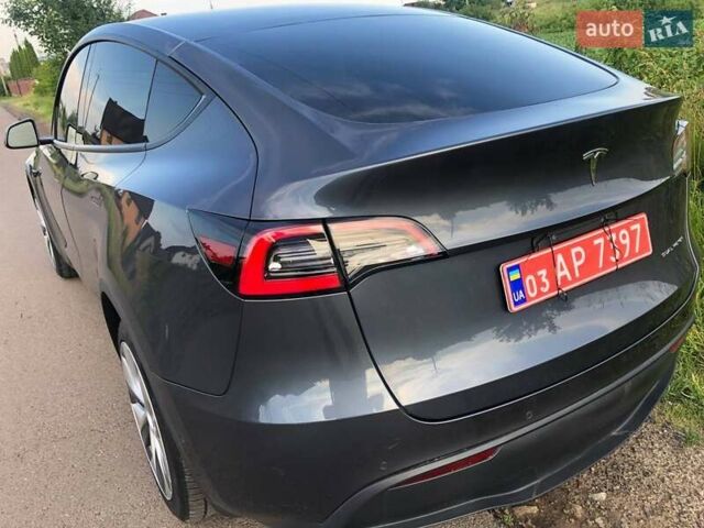 Серый Тесла Model Y, объемом двигателя 0 л и пробегом 77 тыс. км за 22700 $, фото 7 на Automoto.ua