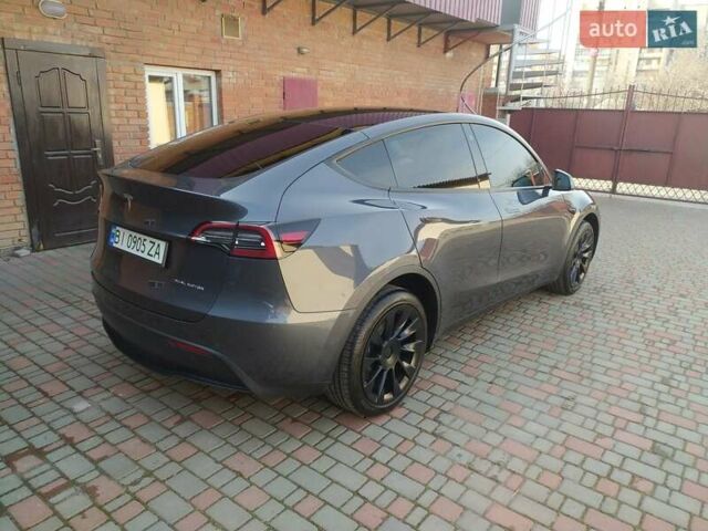 Серый Тесла Model Y, объемом двигателя 0 л и пробегом 17 тыс. км за 34500 $, фото 11 на Automoto.ua