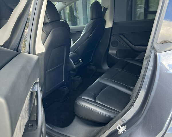 Серый Тесла Model Y, объемом двигателя 0 л и пробегом 57 тыс. км за 23300 $, фото 11 на Automoto.ua