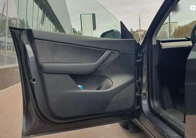 Сірий Тесла Model Y, об'ємом двигуна 0 л та пробігом 84 тис. км за 27900 $, фото 21 на Automoto.ua