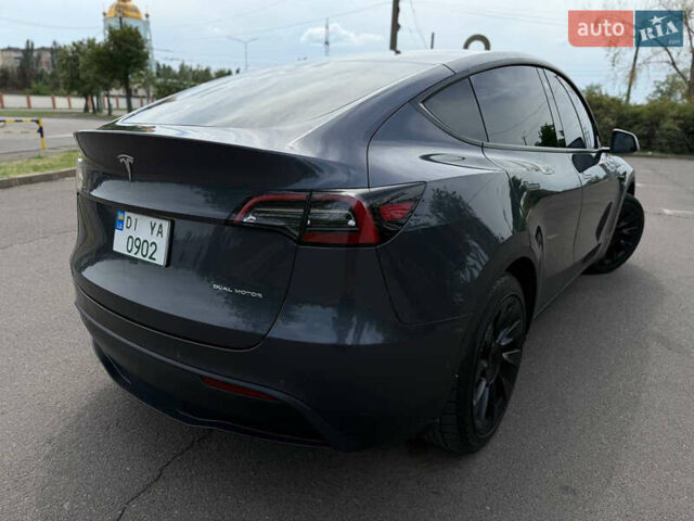 Серый Тесла Model Y, объемом двигателя 0 л и пробегом 91 тыс. км за 26500 $, фото 22 на Automoto.ua