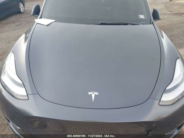 Серый Тесла Model Y, объемом двигателя 0 л и пробегом 0 тыс. км за 18300 $, фото 8 на Automoto.ua