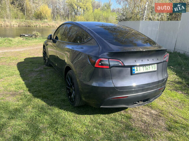 Серый Тесла Model Y, объемом двигателя 0 л и пробегом 68 тыс. км за 33000 $, фото 2 на Automoto.ua