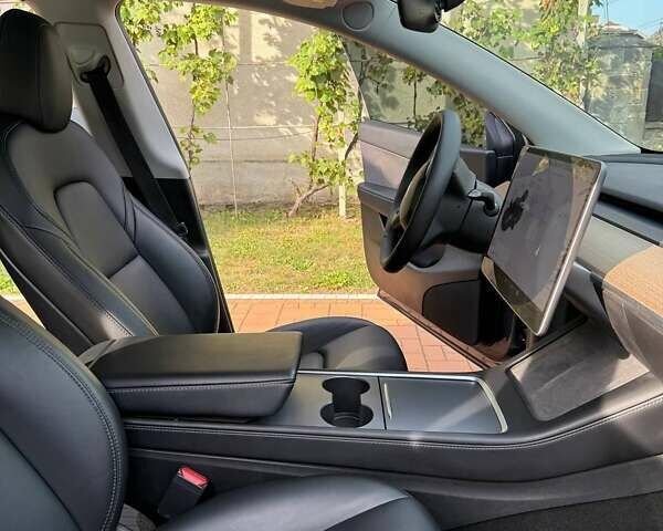 Серый Тесла Model Y, объемом двигателя 0 л и пробегом 100 тыс. км за 25500 $, фото 23 на Automoto.ua