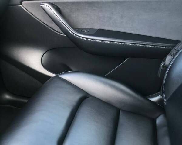 Серый Тесла Model Y, объемом двигателя 0 л и пробегом 77 тыс. км за 22700 $, фото 20 на Automoto.ua