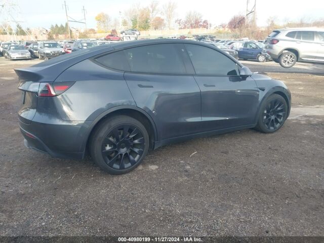 Серый Тесла Model Y, объемом двигателя 0 л и пробегом 0 тыс. км за 18300 $, фото 5 на Automoto.ua