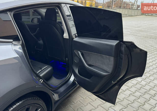 Серый Тесла Model Y, объемом двигателя 0 л и пробегом 138 тыс. км за 20200 $, фото 33 на Automoto.ua