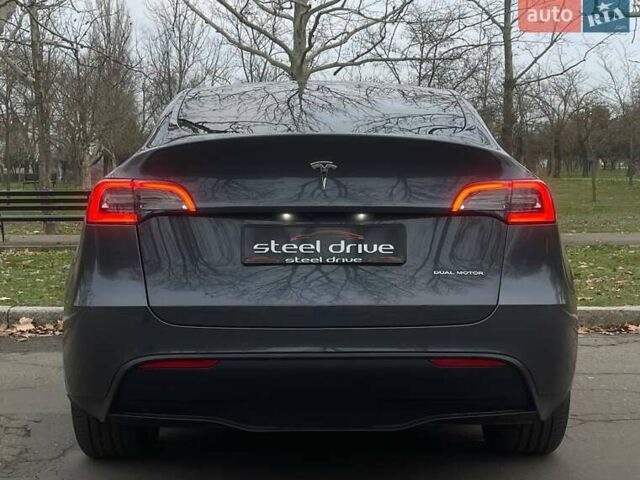 Серый Тесла Model Y, объемом двигателя 0 л и пробегом 92 тыс. км за 24499 $, фото 5 на Automoto.ua