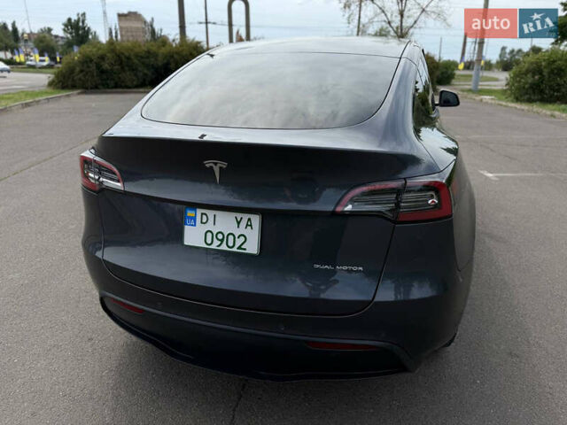 Серый Тесла Model Y, объемом двигателя 0 л и пробегом 91 тыс. км за 26500 $, фото 23 на Automoto.ua
