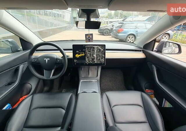 Серый Тесла Model Y, объемом двигателя 0 л и пробегом 84 тыс. км за 24999 $, фото 30 на Automoto.ua