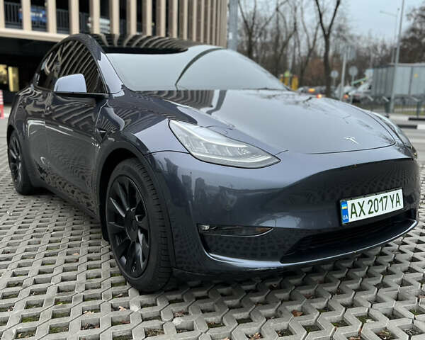 Серый Тесла Model Y, объемом двигателя 0 л и пробегом 22 тыс. км за 26900 $, фото 2 на Automoto.ua