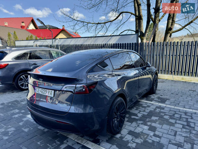 Серый Тесла Model Y, объемом двигателя 0 л и пробегом 78 тыс. км за 28000 $, фото 1 на Automoto.ua