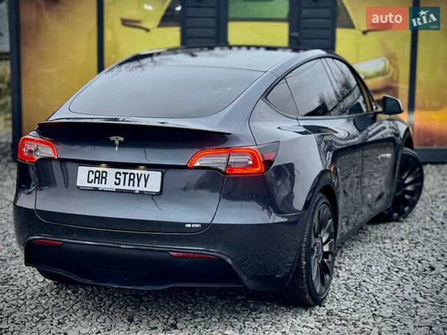 Серый Тесла Model Y, объемом двигателя 0 л и пробегом 107 тыс. км за 23999 $, фото 20 на Automoto.ua