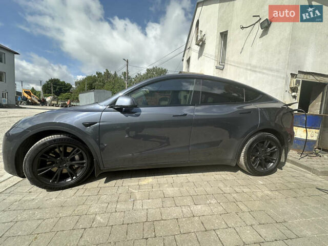 Серый Тесла Model Y, объемом двигателя 0 л и пробегом 55 тыс. км за 29000 $, фото 4 на Automoto.ua