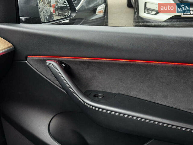 Серый Тесла Model Y, объемом двигателя 0 л и пробегом 98 тыс. км за 29490 $, фото 14 на Automoto.ua