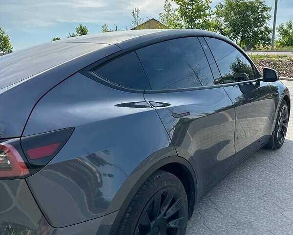 Серый Тесла Model Y, объемом двигателя 0 л и пробегом 74 тыс. км за 27800 $, фото 16 на Automoto.ua