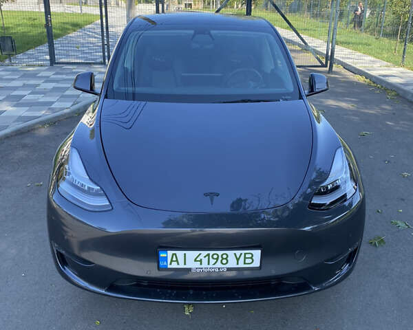 Серый Тесла Model Y, объемом двигателя 0 л и пробегом 73 тыс. км за 25000 $, фото 1 на Automoto.ua