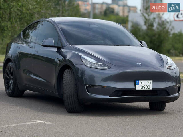 Серый Тесла Model Y, объемом двигателя 0 л и пробегом 91 тыс. км за 26500 $, фото 3 на Automoto.ua