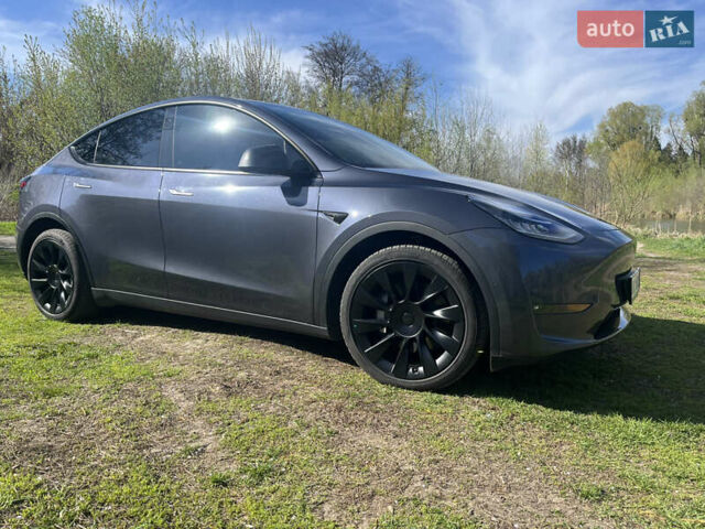 Серый Тесла Model Y, объемом двигателя 0 л и пробегом 68 тыс. км за 33000 $, фото 1 на Automoto.ua