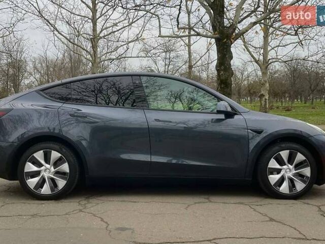 Серый Тесла Model Y, объемом двигателя 0 л и пробегом 92 тыс. км за 24499 $, фото 3 на Automoto.ua
