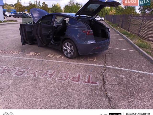 Серый Тесла Model Y, объемом двигателя 0 л и пробегом 80 тыс. км за 25000 $, фото 5 на Automoto.ua