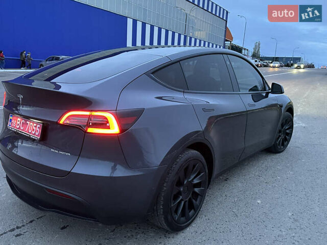 Серый Тесла Model Y, объемом двигателя 0 л и пробегом 110 тыс. км за 23700 $, фото 3 на Automoto.ua