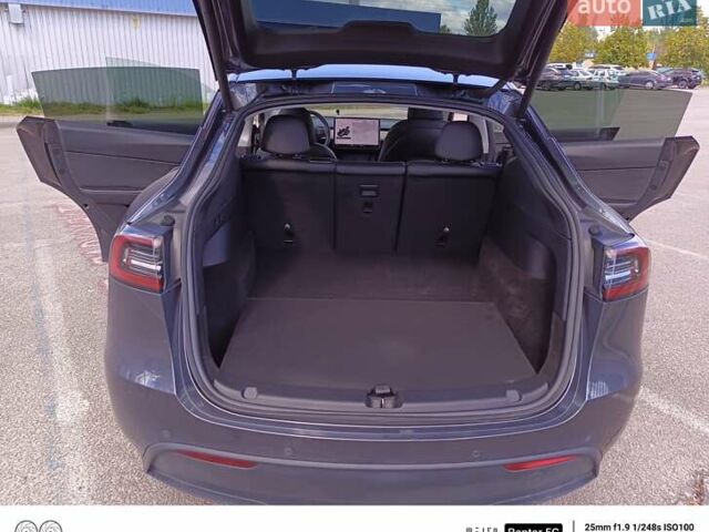 Серый Тесла Model Y, объемом двигателя 0 л и пробегом 80 тыс. км за 25000 $, фото 6 на Automoto.ua