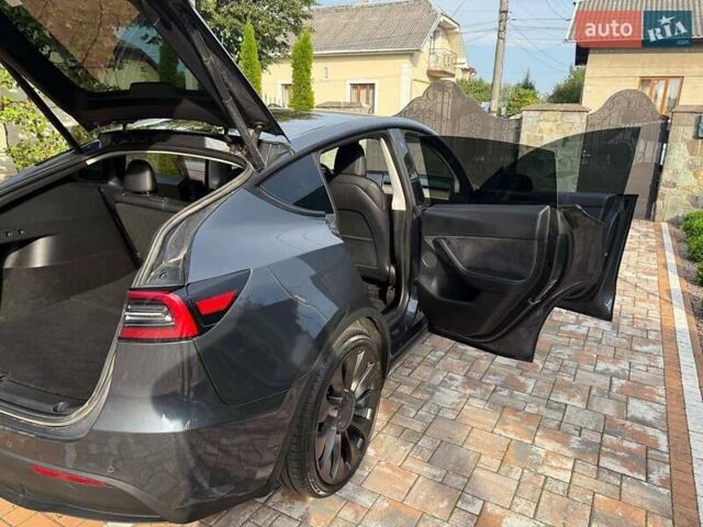 Серый Тесла Model Y, объемом двигателя 0 л и пробегом 100 тыс. км за 25500 $, фото 15 на Automoto.ua