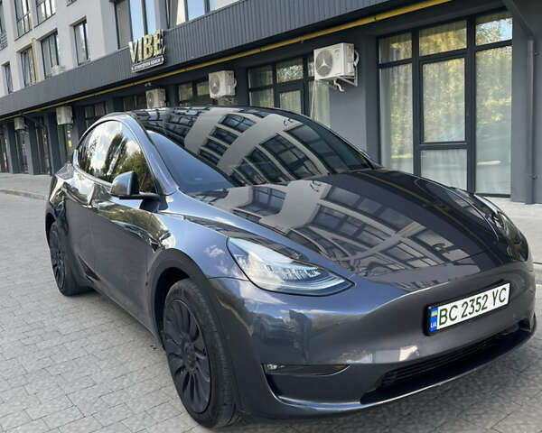 Серый Тесла Model Y, объемом двигателя 0 л и пробегом 57 тыс. км за 23300 $, фото 1 на Automoto.ua