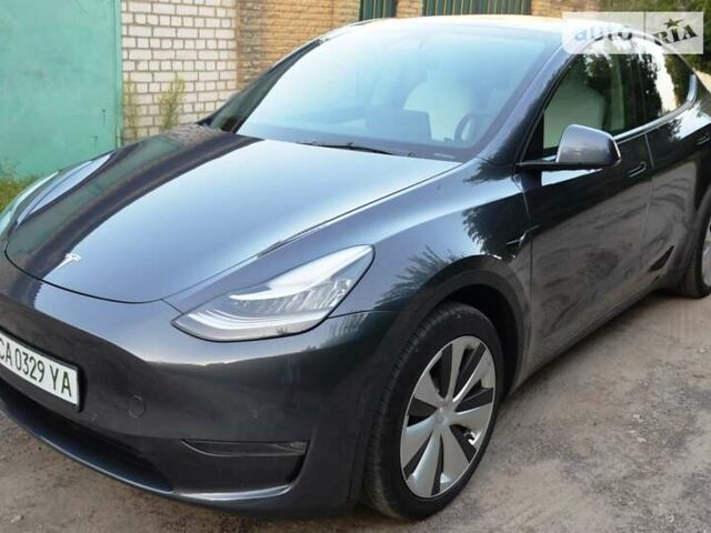 Серый Тесла Model Y, объемом двигателя 0 л и пробегом 52 тыс. км за 26000 $, фото 1 на Automoto.ua