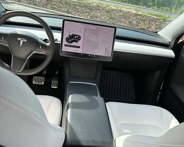 Серый Тесла Model Y, объемом двигателя 0 л и пробегом 74 тыс. км за 27800 $, фото 7 на Automoto.ua