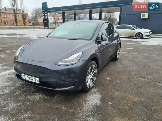 Серый Тесла Model Y, объемом двигателя 0 л и пробегом 85 тыс. км за 28500 $, фото 1 на Automoto.ua