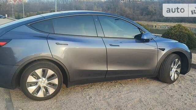 Серый Тесла Model Y, объемом двигателя 0 л и пробегом 61 тыс. км за 22900 $, фото 4 на Automoto.ua